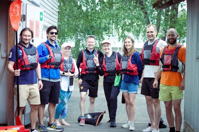 Happy team wearing life jackets